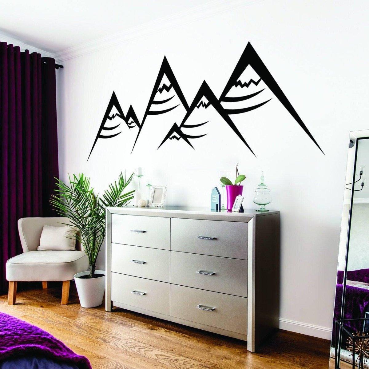 Boho modern vinyl wall decal featuring geometric mountain peaks design in stylish interior setting.