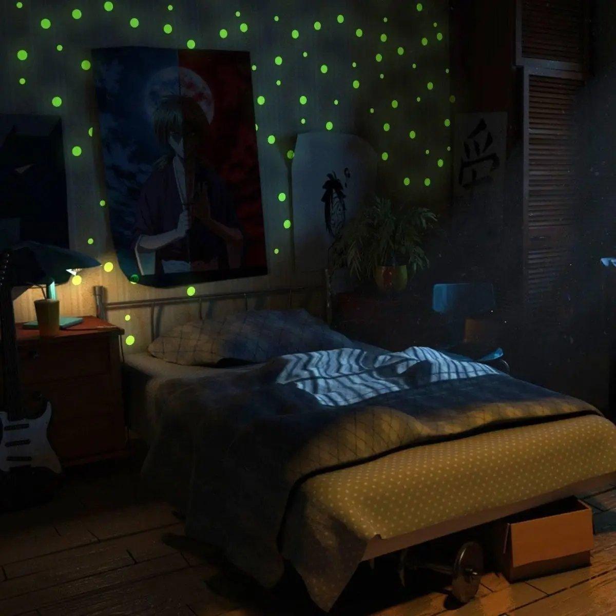 Cozy bedroom with luminous circle wall decals, creating a starry ambiance on the walls.