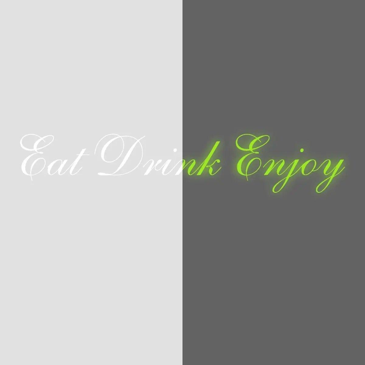 Glow in dark 'Eat Drink Enjoy' vinyl decal on a grey and white background for kitchen decor.