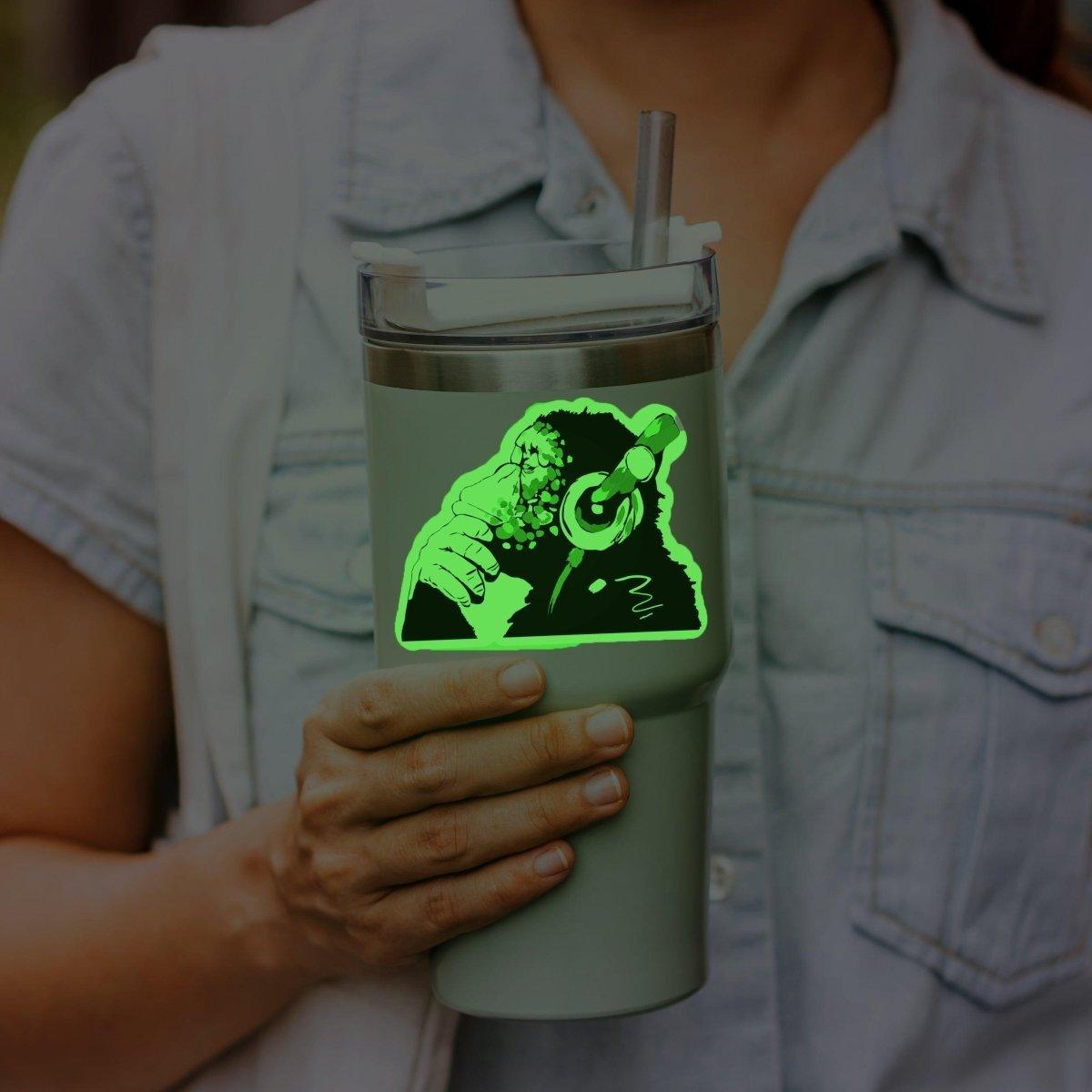 Glow in the dark monkey vinyl decal on a reusable tumbler, adding fun and personality to the drinkware.