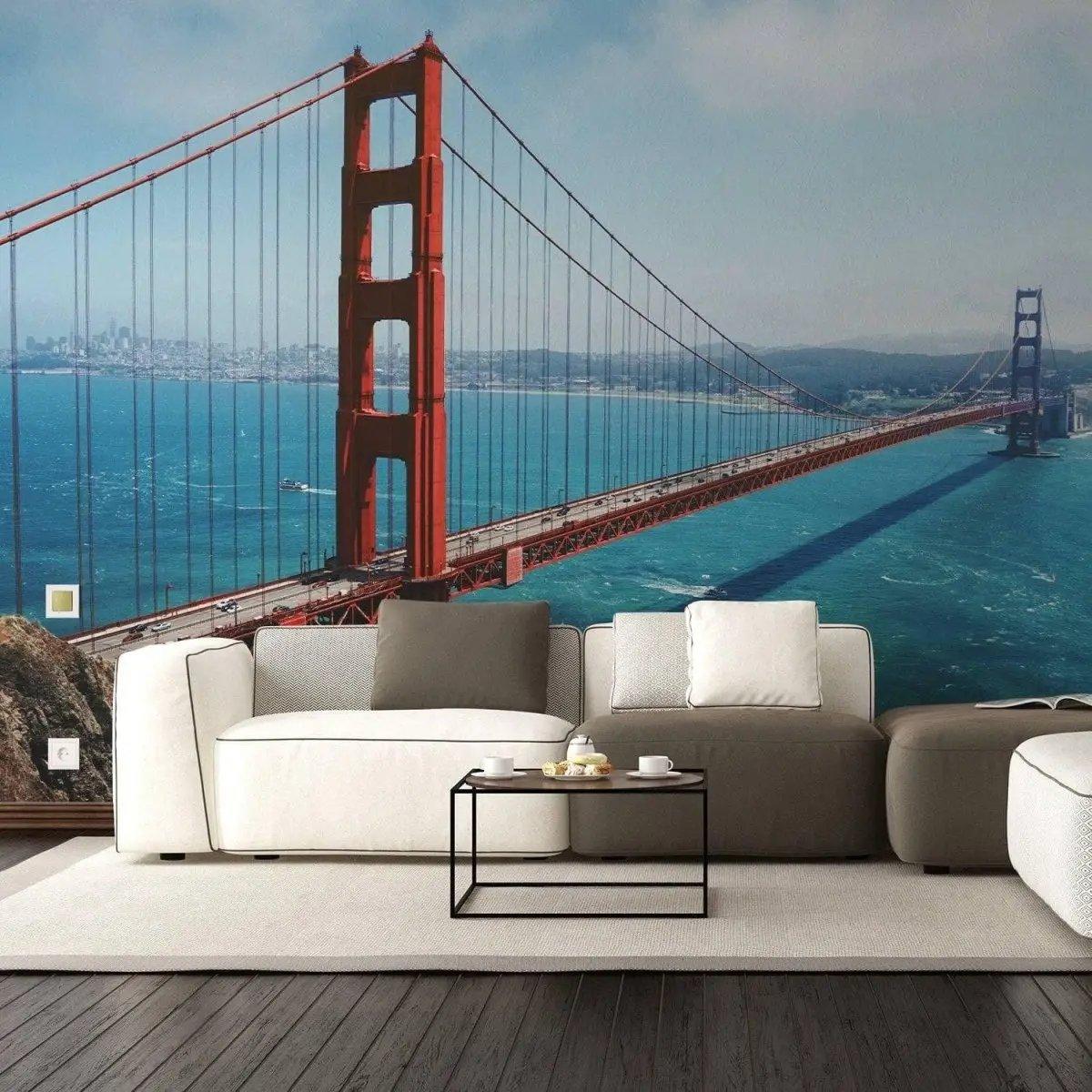 Golden Gate Bridge vinyl wall decal over living room sofa, showcasing San Francisco skyline and stunning ocean view.