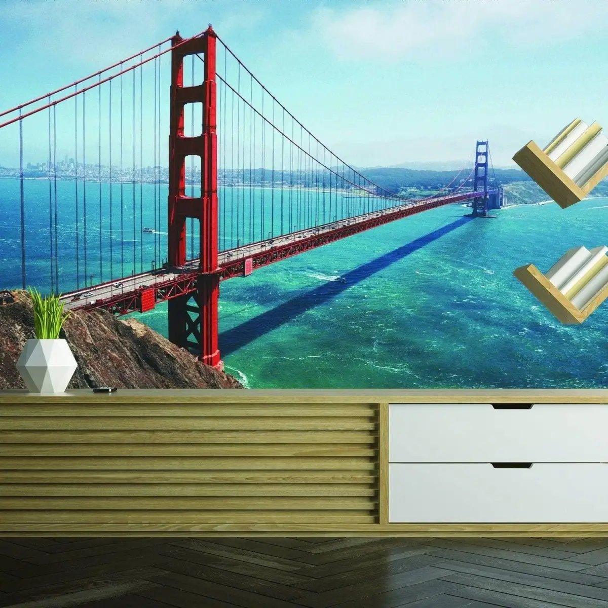 Golden Gate Bridge vinyl wall decal in a modern living room with ocean view.
