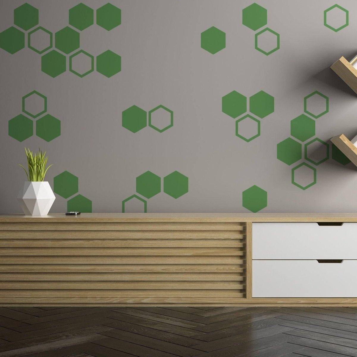 Elegant green hexagon wall decals creating a stunning honeycomb effect in a stylish room.