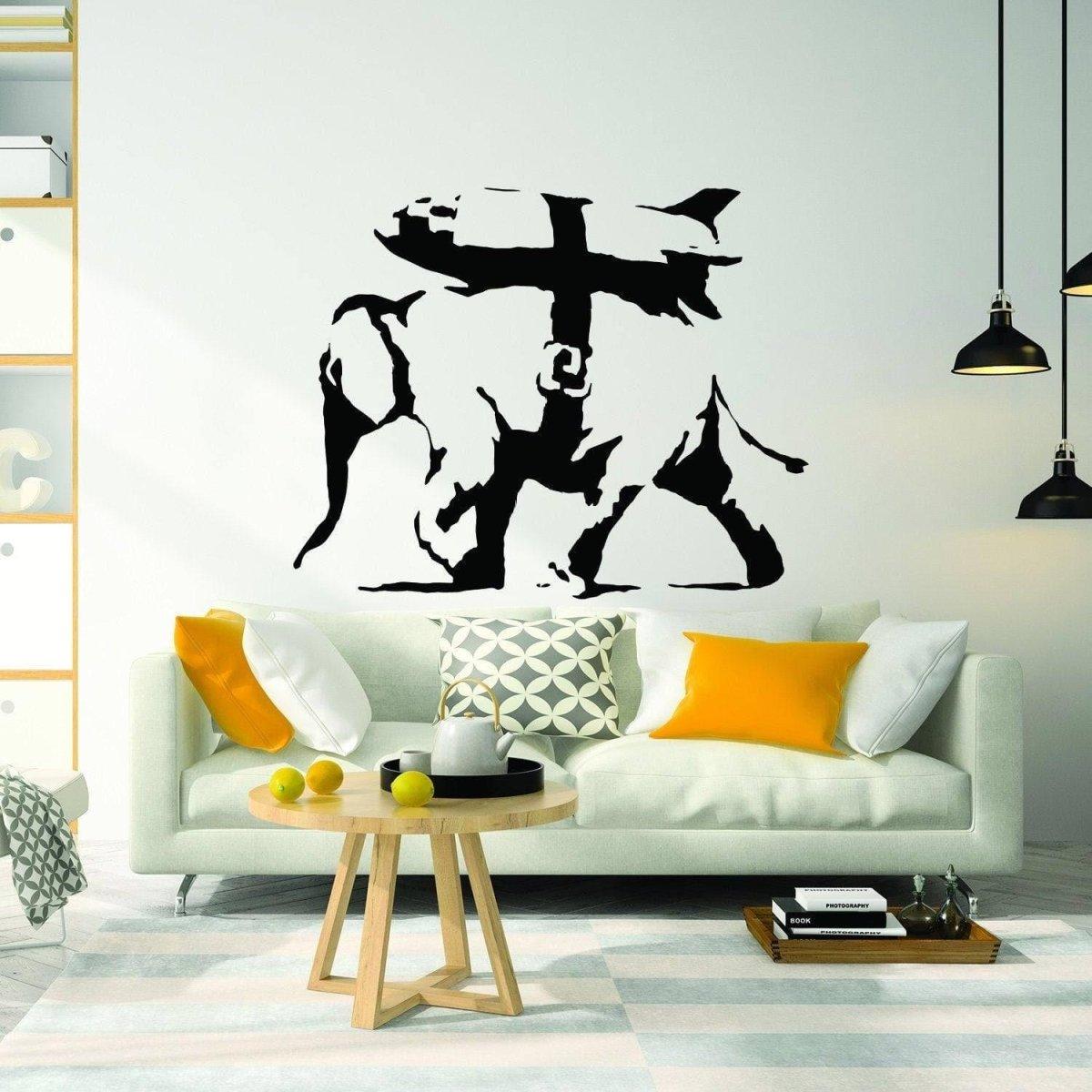 Majestic elephant graffiti style vinyl sticker on a modern living room wall above a stylish couch.
