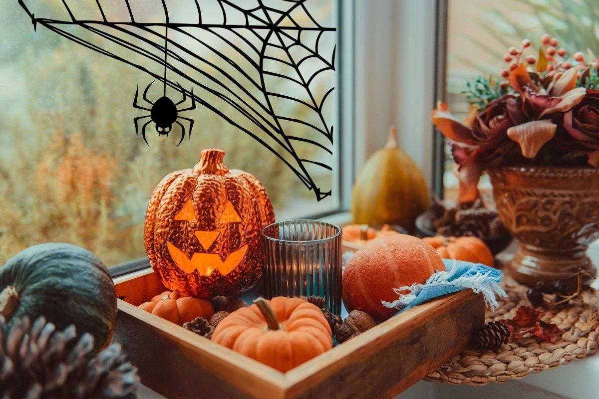 Halloween Spider Web Wall Decal with spider above a festive pumpkin display, creating spooky seasonal decor.