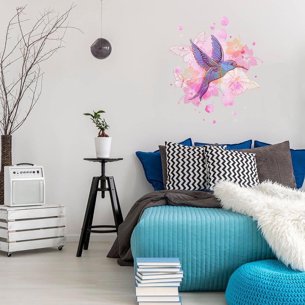 Colorful hummingbird wall vinyl sticker in a stylish bedroom, adding charm and nature-inspired decor.