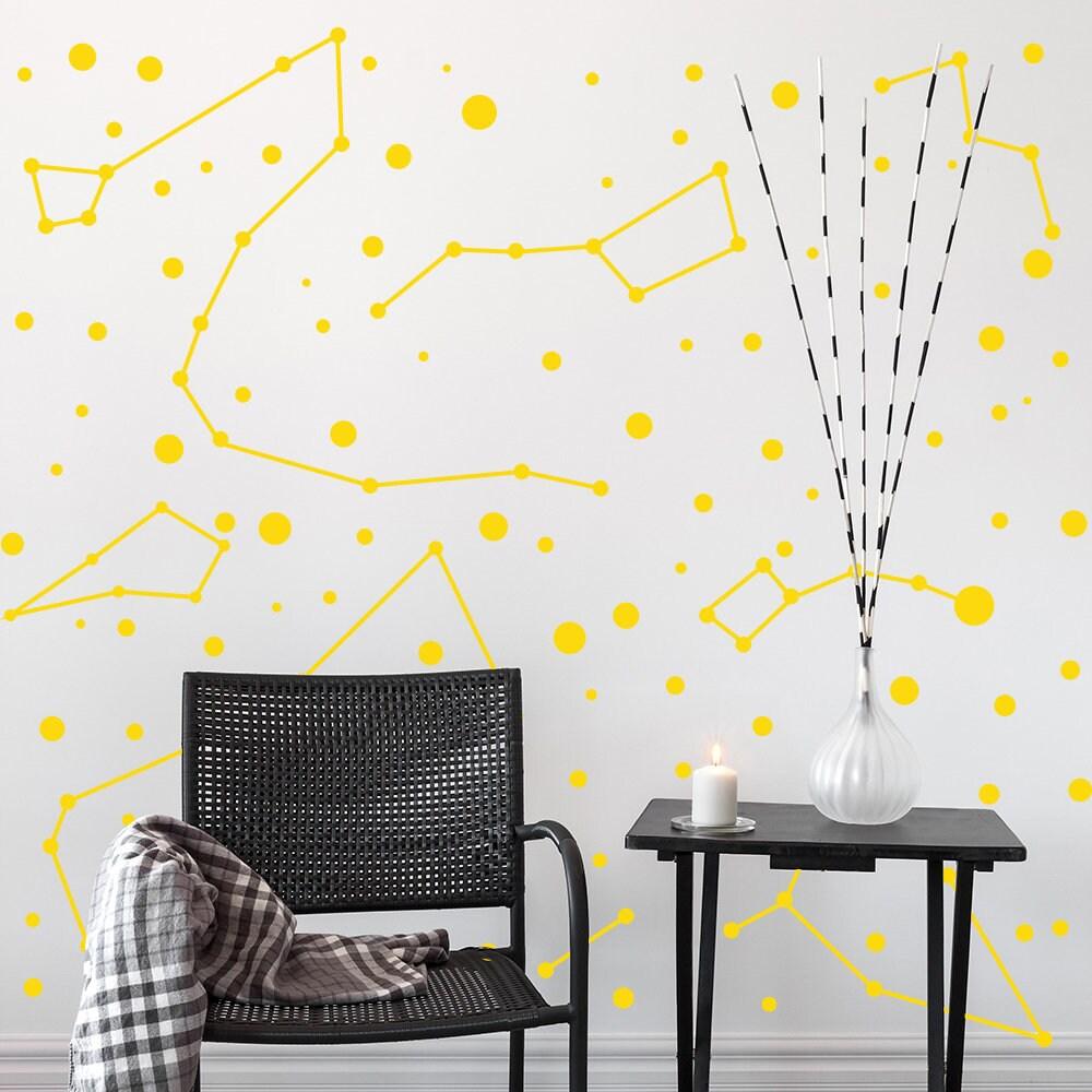 Yellow constellation wall stickers featuring stars and zodiac designs in a modern room setting.