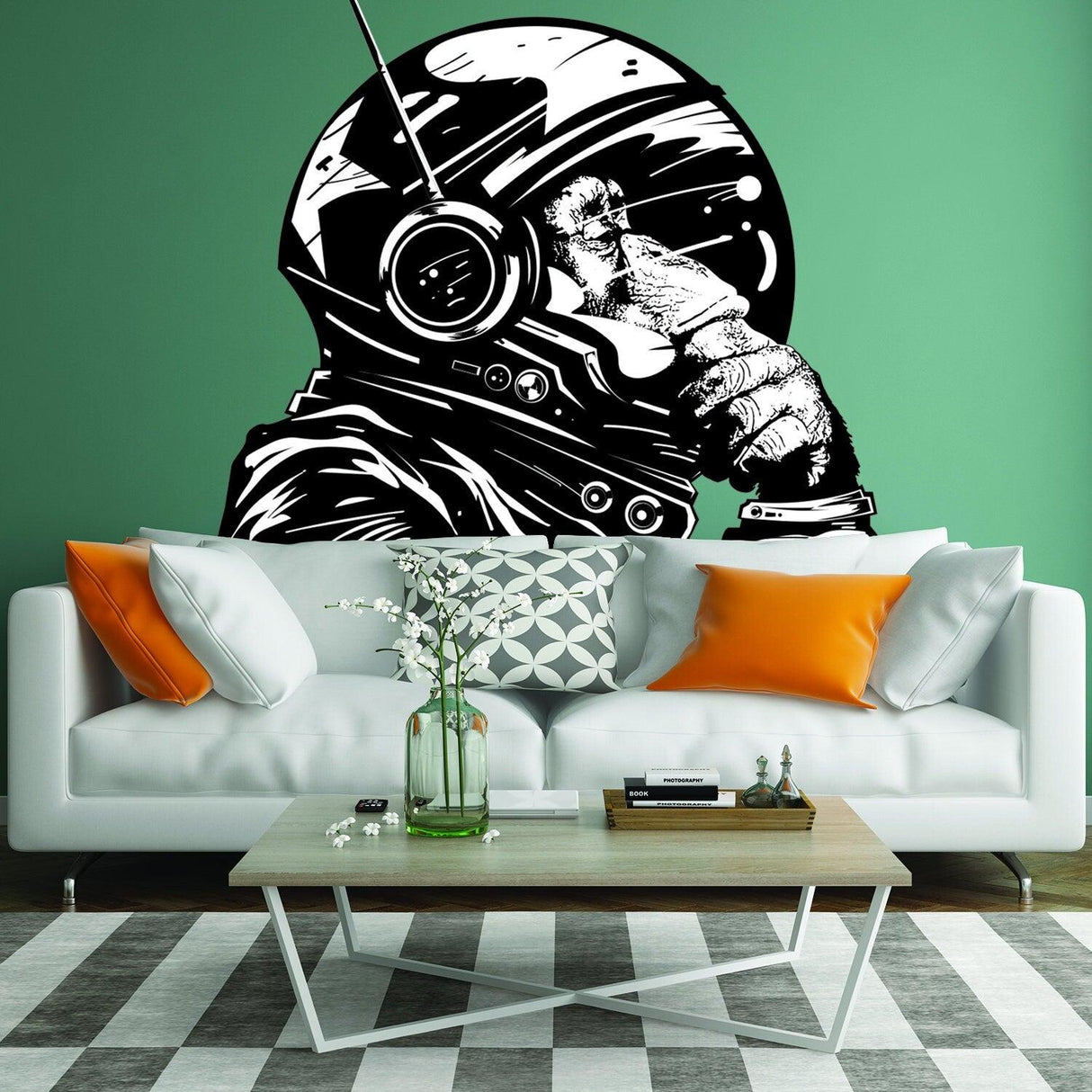 Thinker astronaut monkey wall decal on green wall above modern sofa, creating a whimsical and creative home atmosphere.