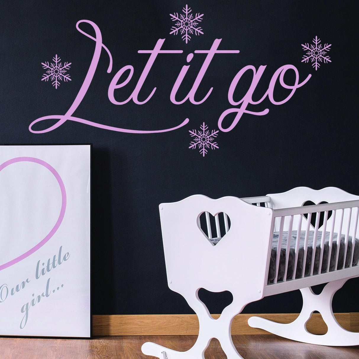Let It Go wall sticker in pink with snowflakes, perfect for nursery decor, inspiring positive thoughts.