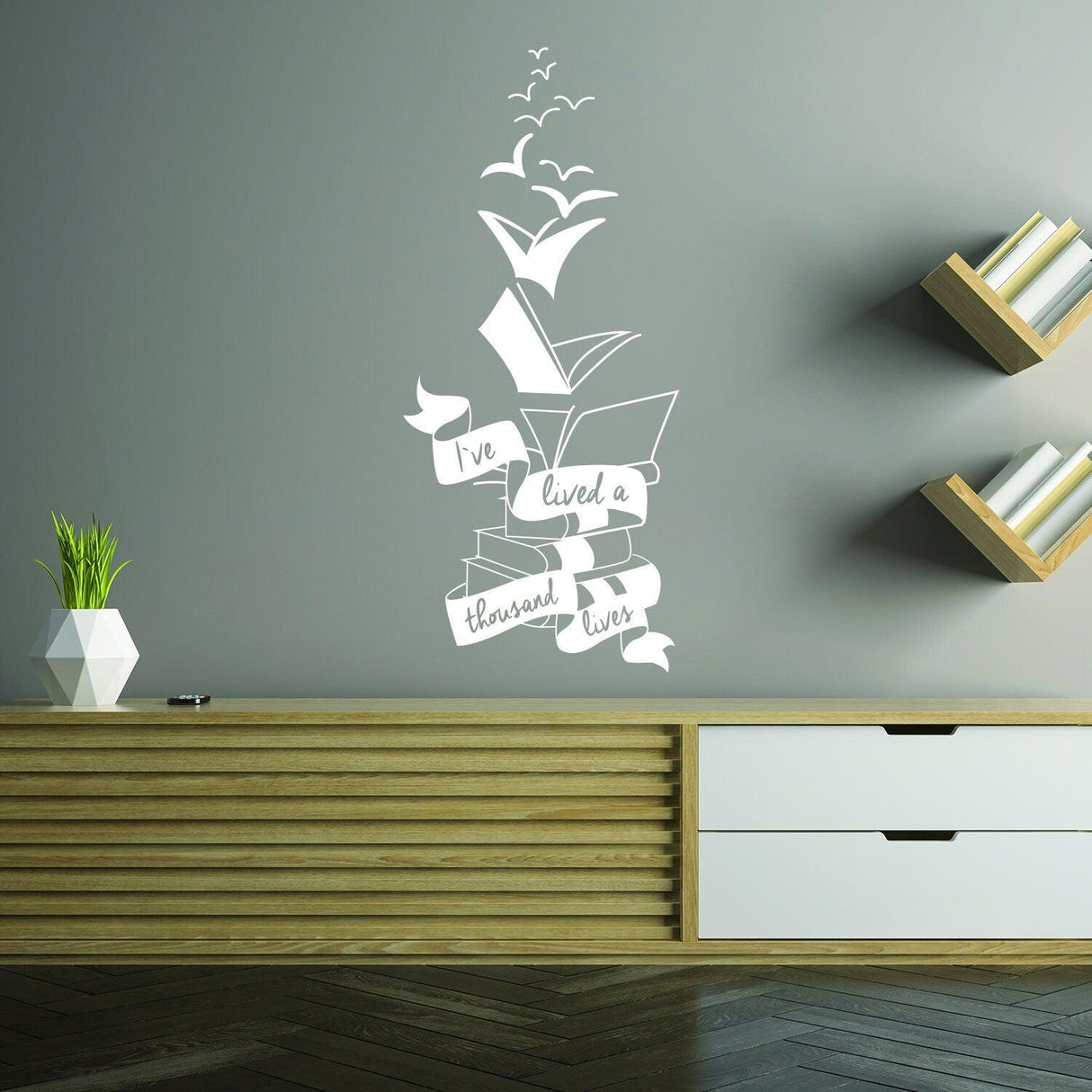 Motivational wall decal quote featuring stacked books and inspirational text on a gray wall.