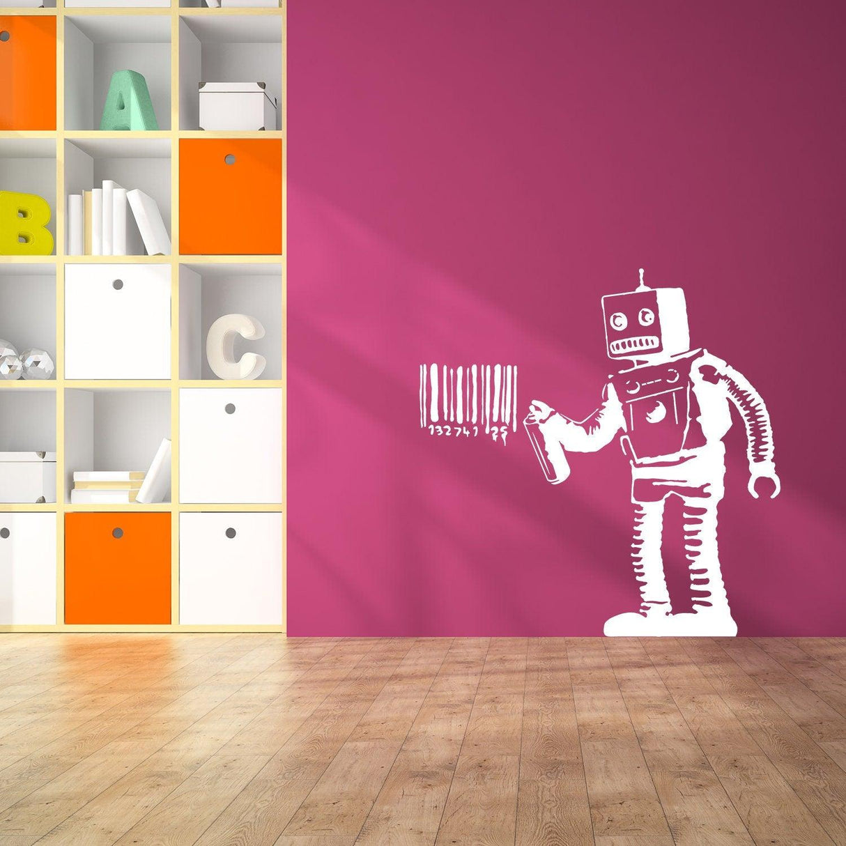 Banksy Barcode Robot Wall Vinyl Sticker on a pink wall in a modern, stylish room.