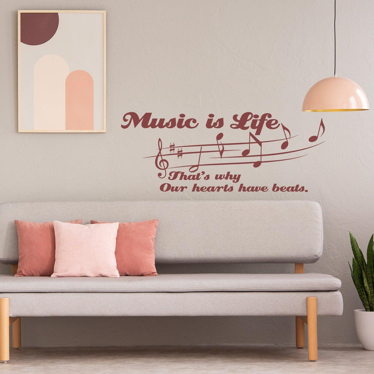 Music is Life wall sticker above a modern sofa, featuring musical notes and an inspiring quote for music lovers.