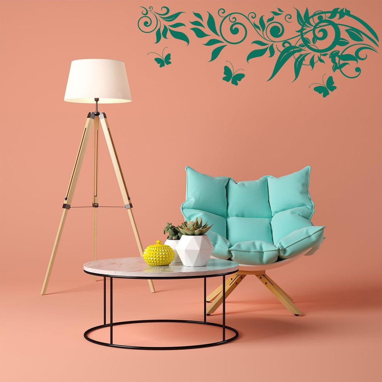 Cozy living room setup featuring a turquoise chair, marble table, and decorative butterfly wall decals.