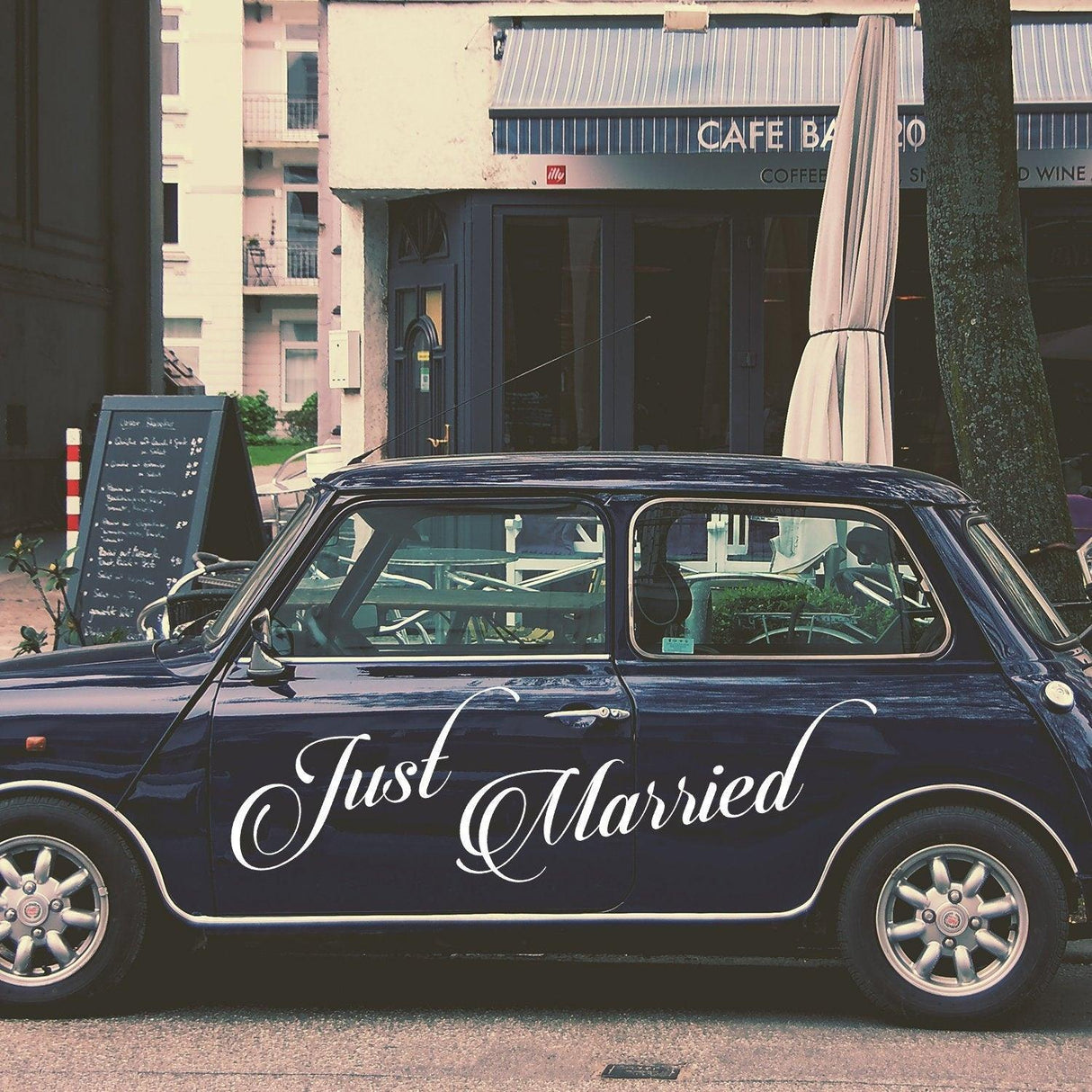 Just Married car window sticker on a stylish vehicle, adding charm to wedding celebrations.