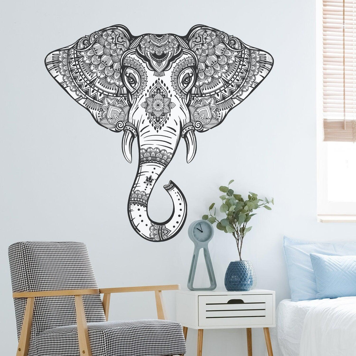 Black and white tribal elephant wall sticker adding character to home decor.
