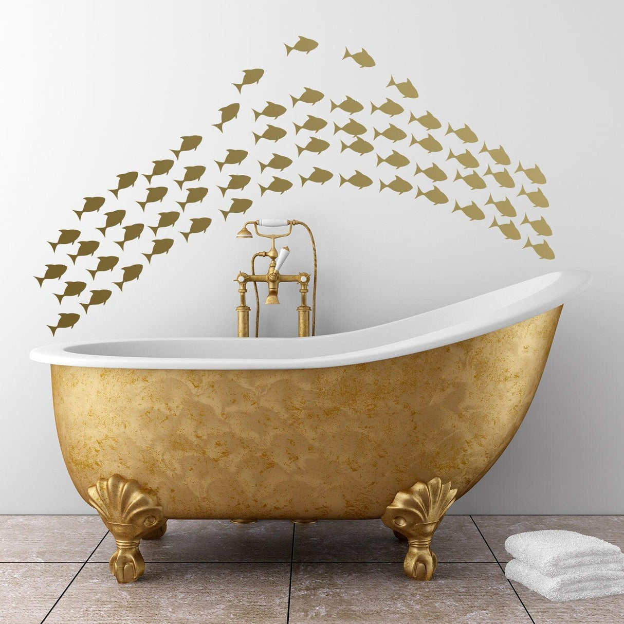 Gold fish vinyl wall stickers above a luxurious bathtub, adding a charming ocean theme to the bathroom decor.