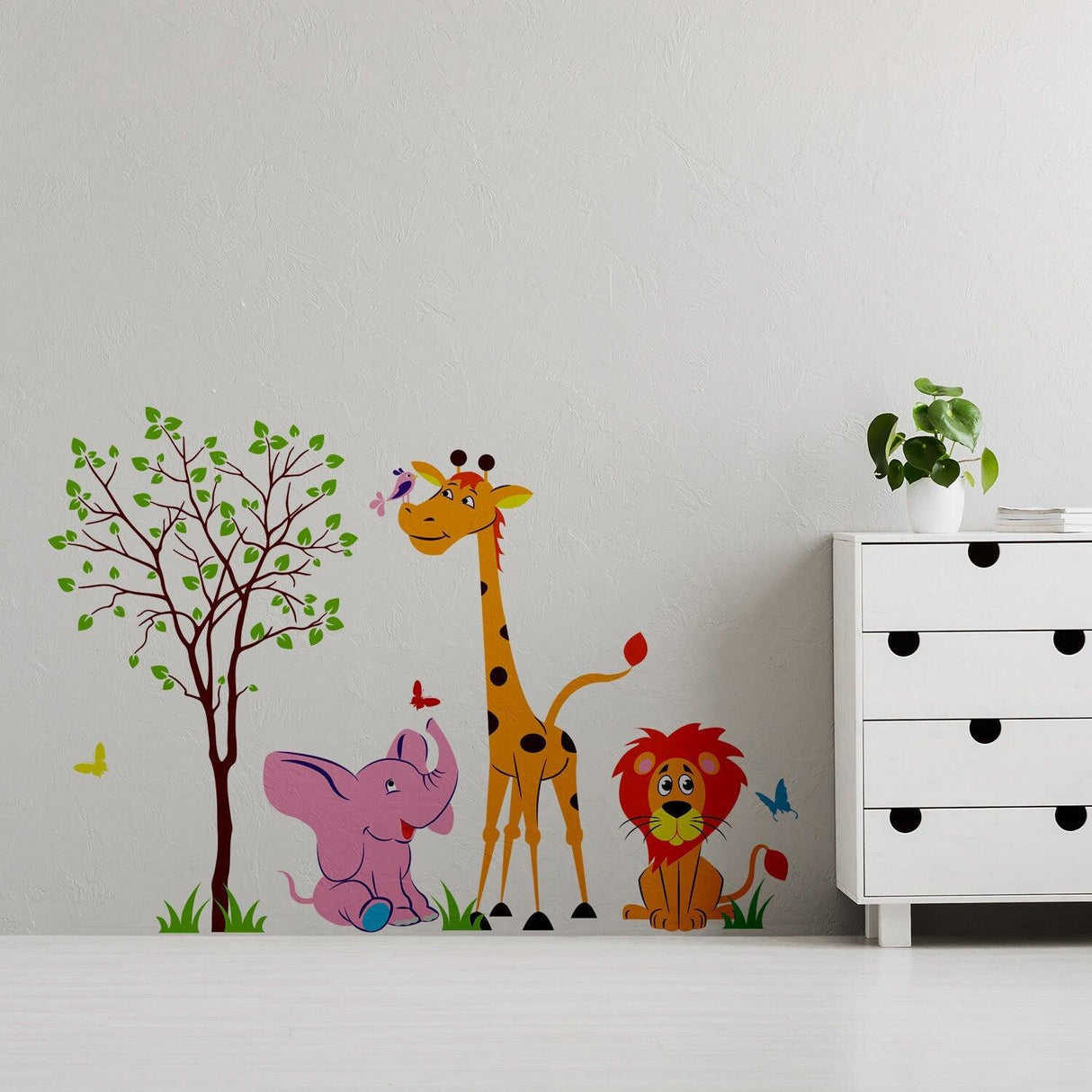 Nursery animal wall decor vinyl sticker featuring cute giraffe, elephant, lion, and tree with butterflies.