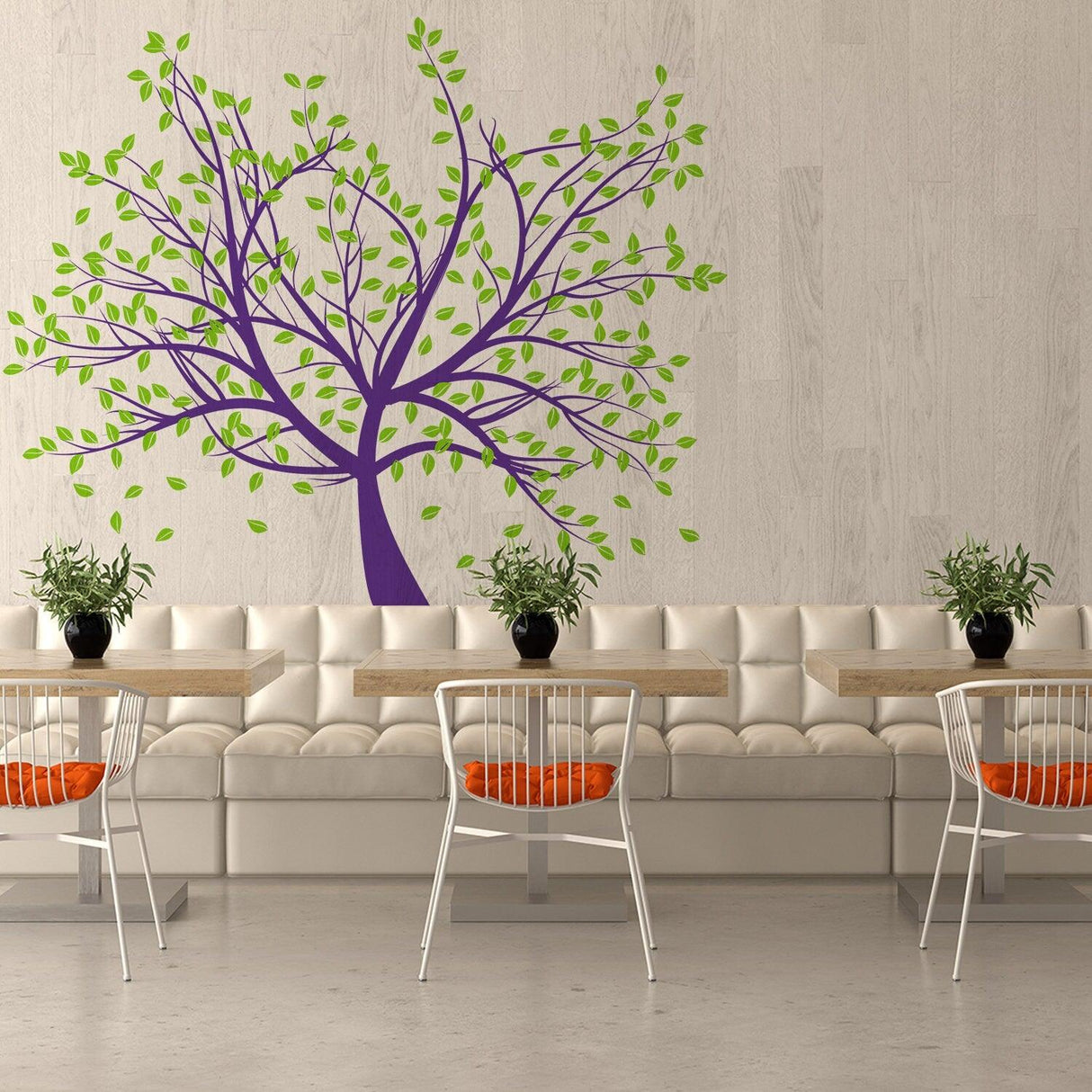 Vibrant purple tree wall decal with green leaves in a modern cafe setting, enhancing the interior decor.