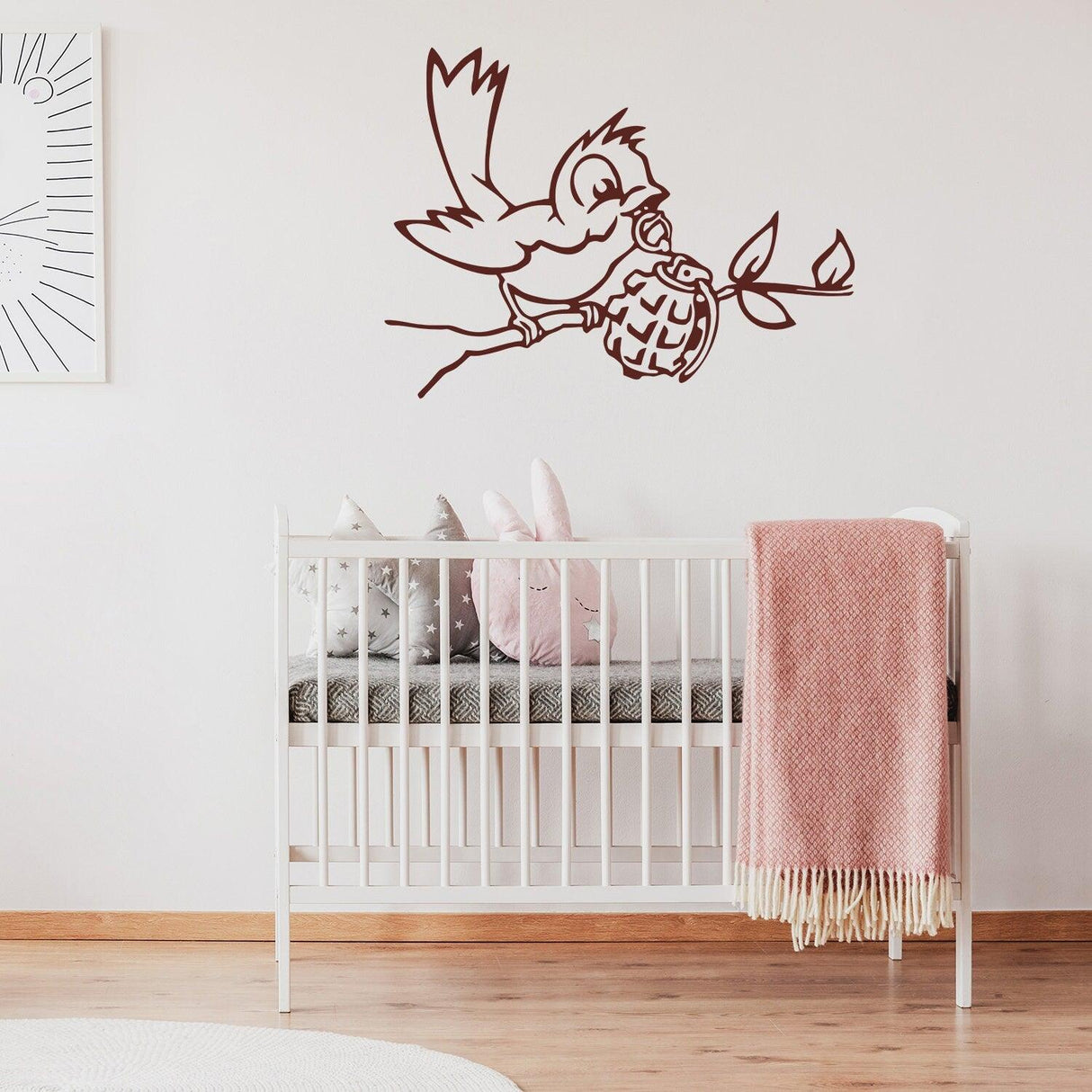 Banksy Bird With Grenade Wall Sticker in nursery decor, adding urban street art vibe to children's room.