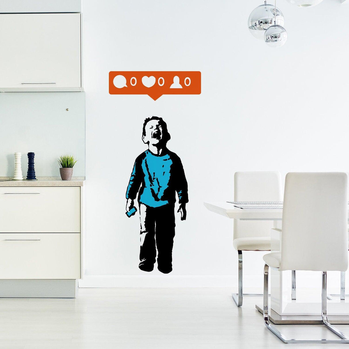 Banksy Crying Boy wall sticker in a modern kitchen with social media icons above.