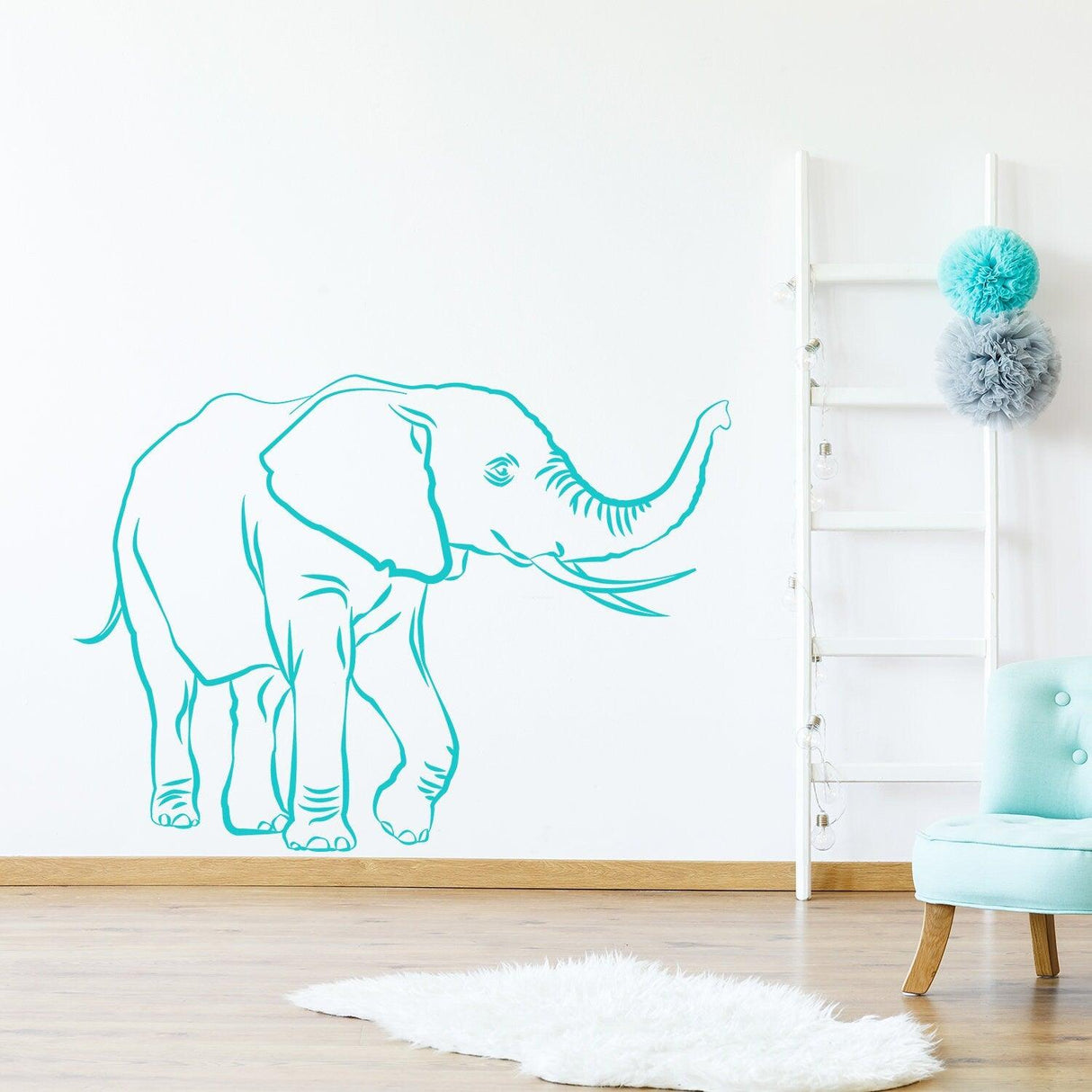 Cute vinyl elephant wall decal featuring a whimsical design, perfect for home decor in any room.