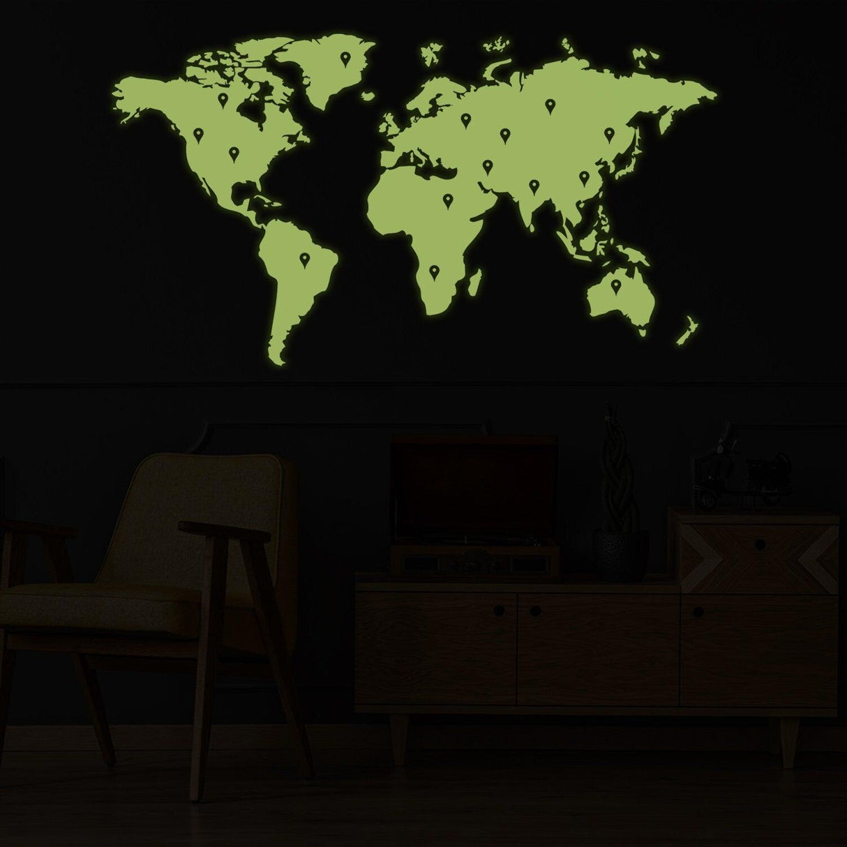 Glow in the dark world map vinyl sticker on wall, creating a striking visual effect in a modern room.