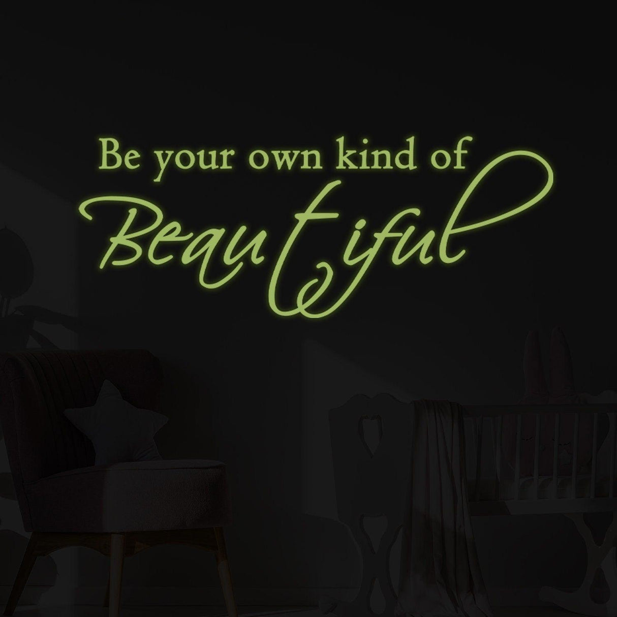 Glow in the dark wall sticker with the quote 'Be your own kind of Beautiful' in elegant font.