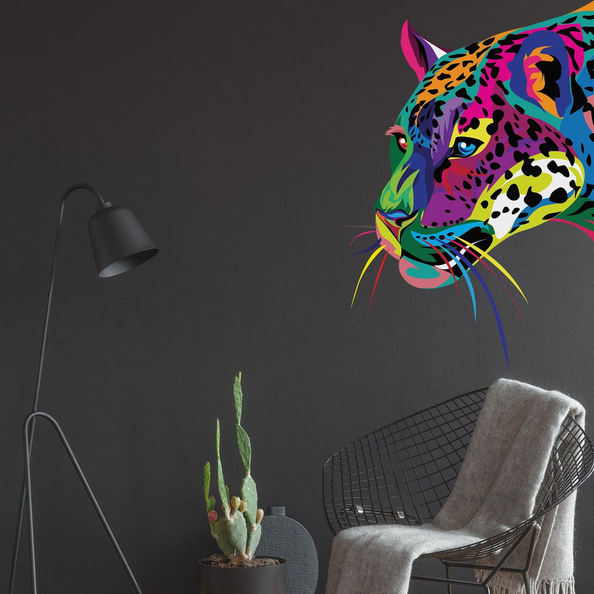 Colorful wild jaguar wall sticker on black wall, adding vibrant elegance to modern decor.