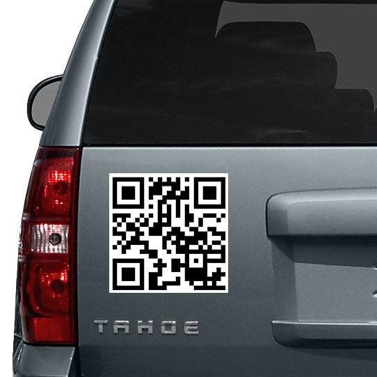Custom QR code sticker on a vehicle rear window, designed for personal or business promotion, showcasing a unique vinyl decal.