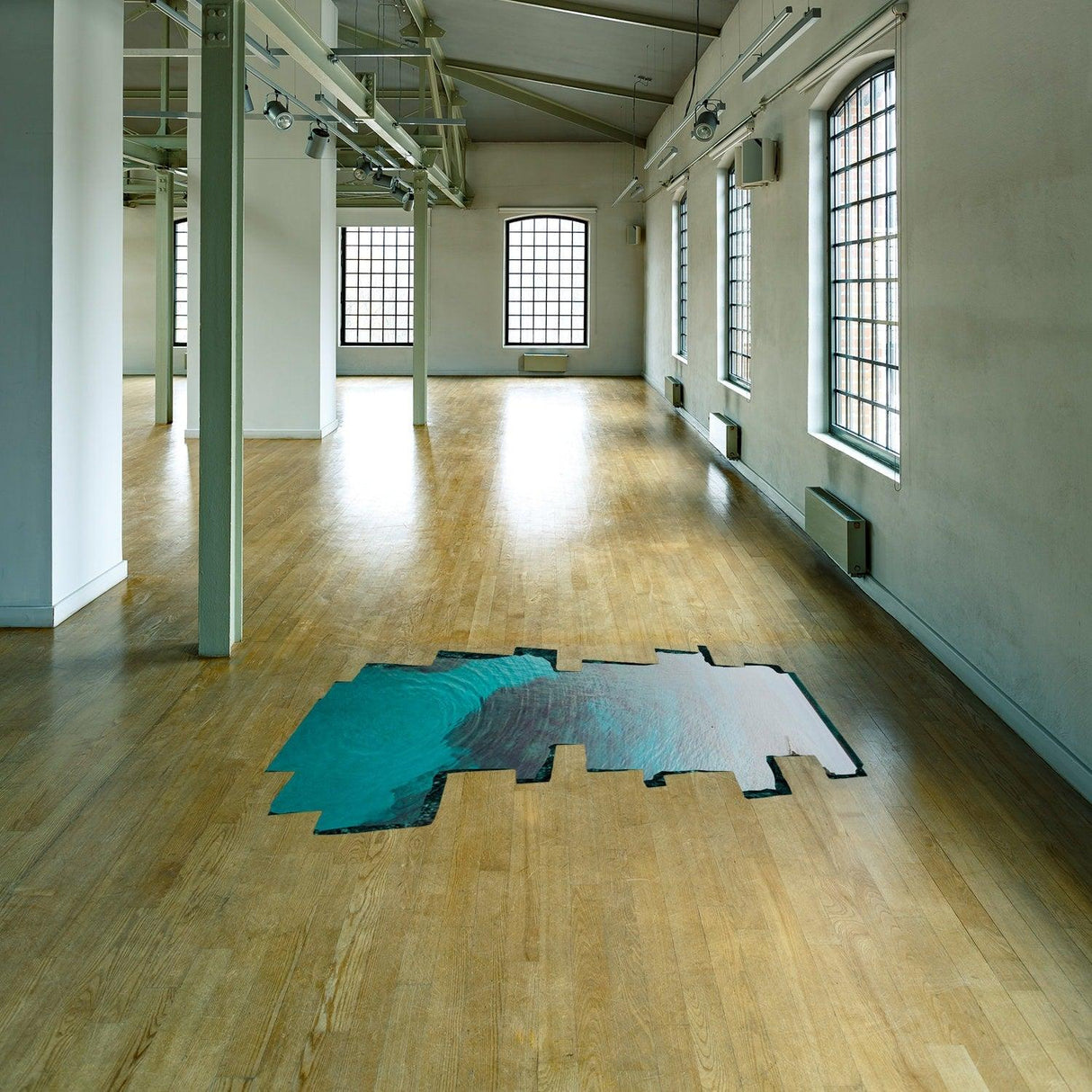 3D Floor Ocean Vinyl Sticker showcasing a porthole effect on wooden floor in an empty, well-lit space.
