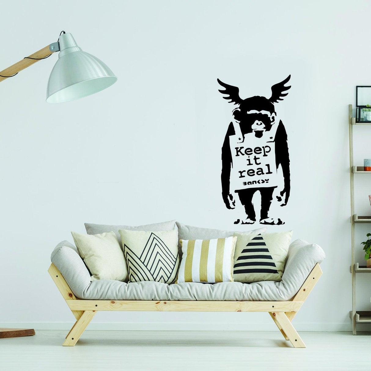 Banksy-inspired wall sticker featuring a monkey with 'Keep it real' text, adding urban art style to modern decor.