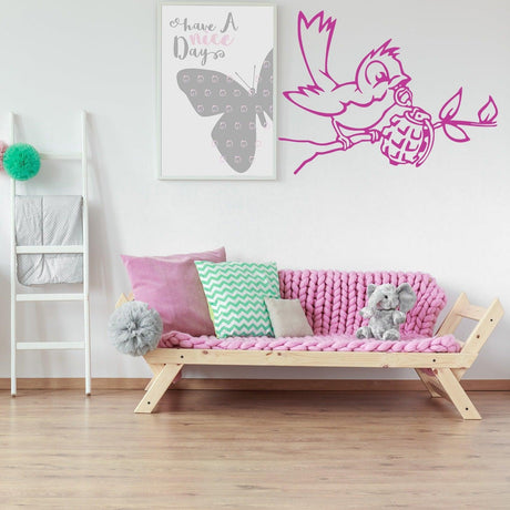 Banksy Bird with Grenade wall sticker in modern living room with pink decor and abstract artwork.