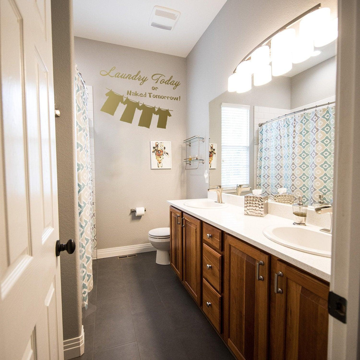 Stylish bathroom with Laundry Today vinyl sticker on the wall, featuring a chic design and modern decor.