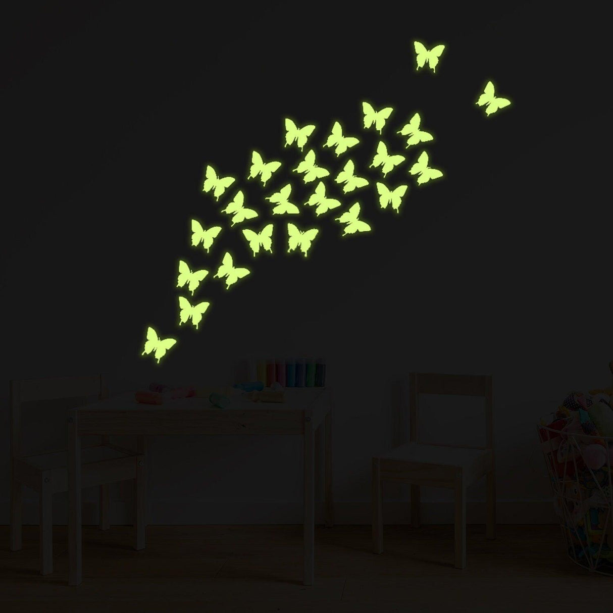 Glow-in-the-dark butterflies wall decal in a playful arrangement, enhancing decor with magical nighttime glow.