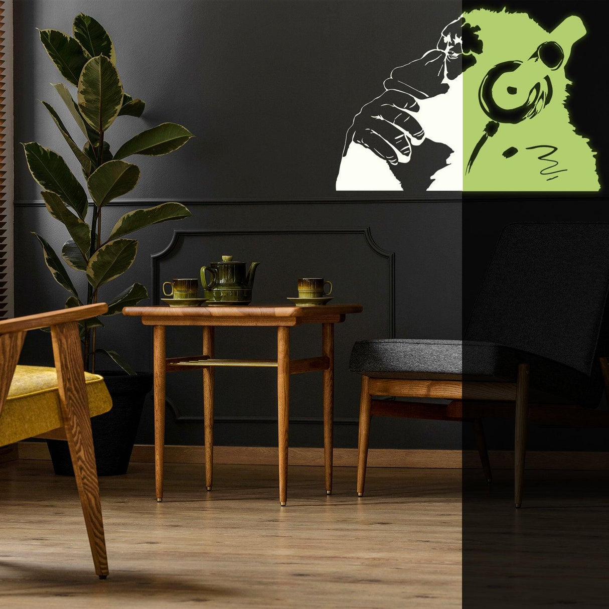 Banksy glowing vinyl wall decal of a monkey with headphones in a modern living room setting.