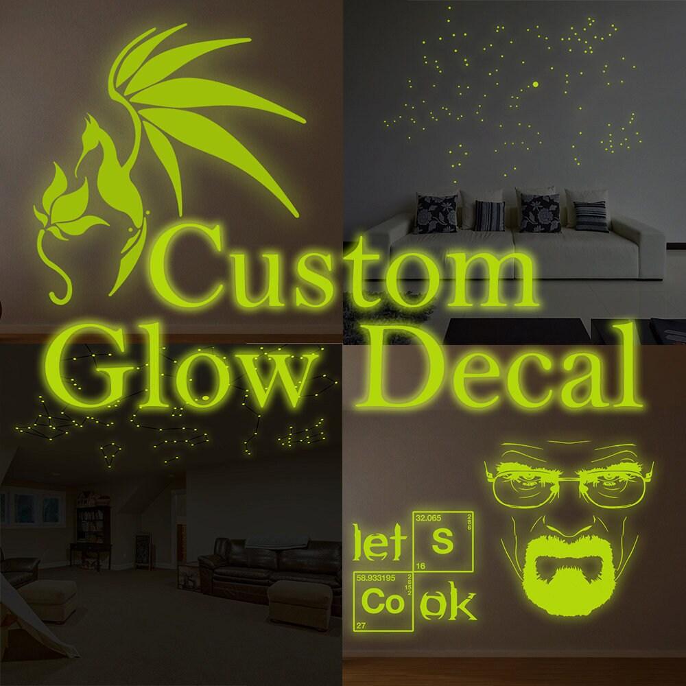 Custom glowing vinyl wall decals featuring designs on walls and ceilings for personalized home decor.