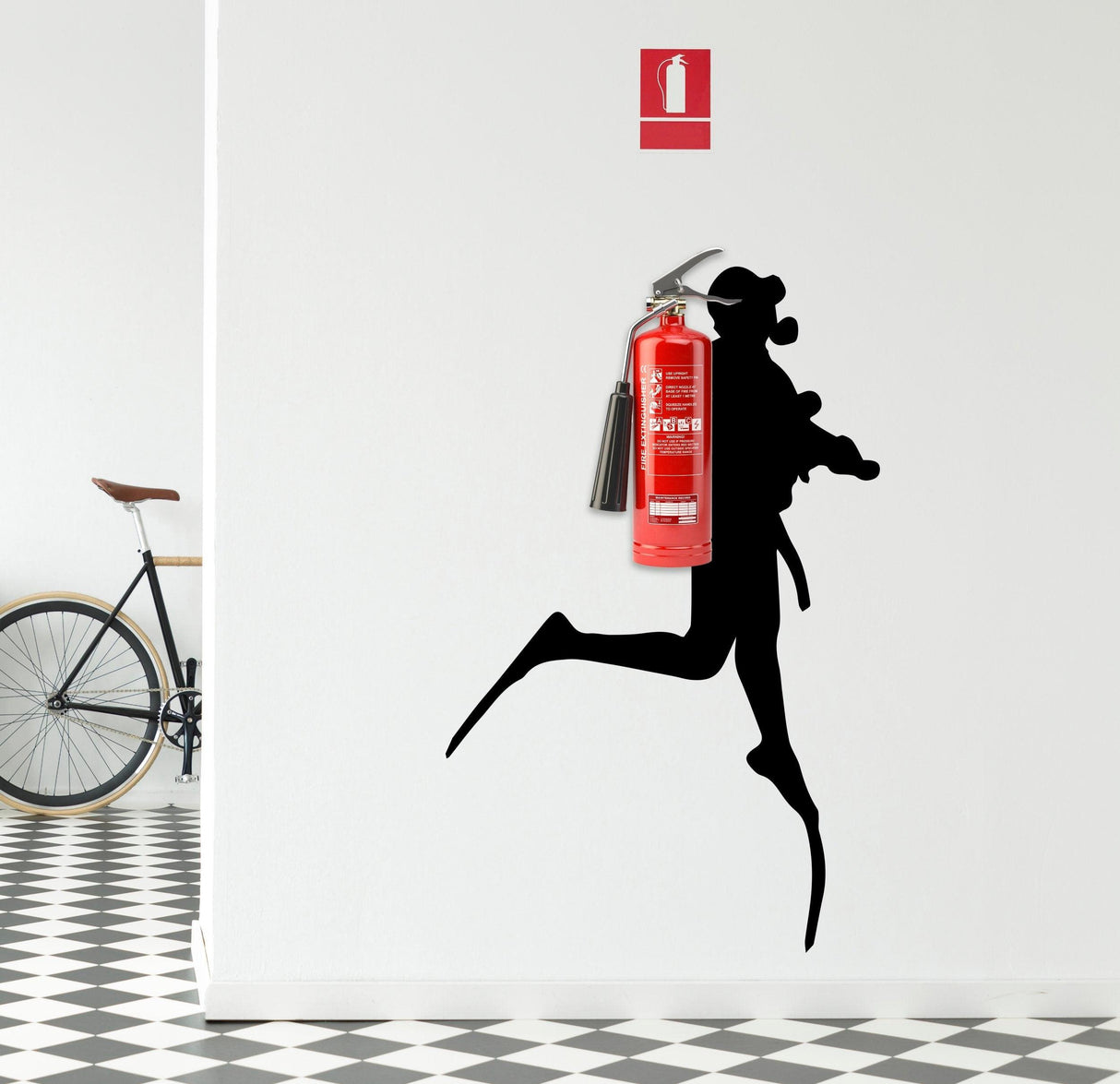 Silhouette of a scuba diver holding a fire extinguisher, wall sticker decor enhancing modern interior.