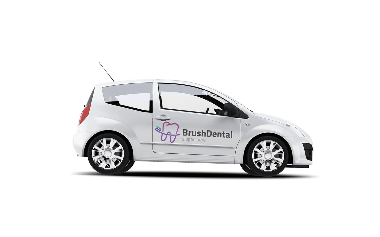 White car with BrushDental logo and graphic design for dental services on the side.