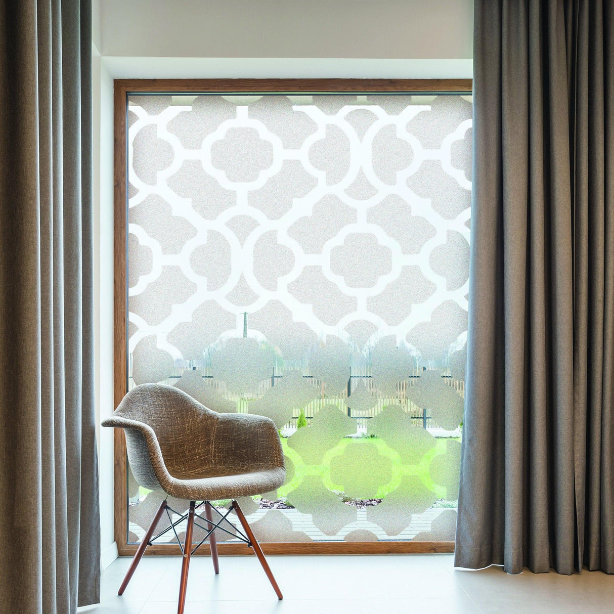 Stylish frosted window film design featuring geometric patterns, enhancing privacy while allowing natural light.