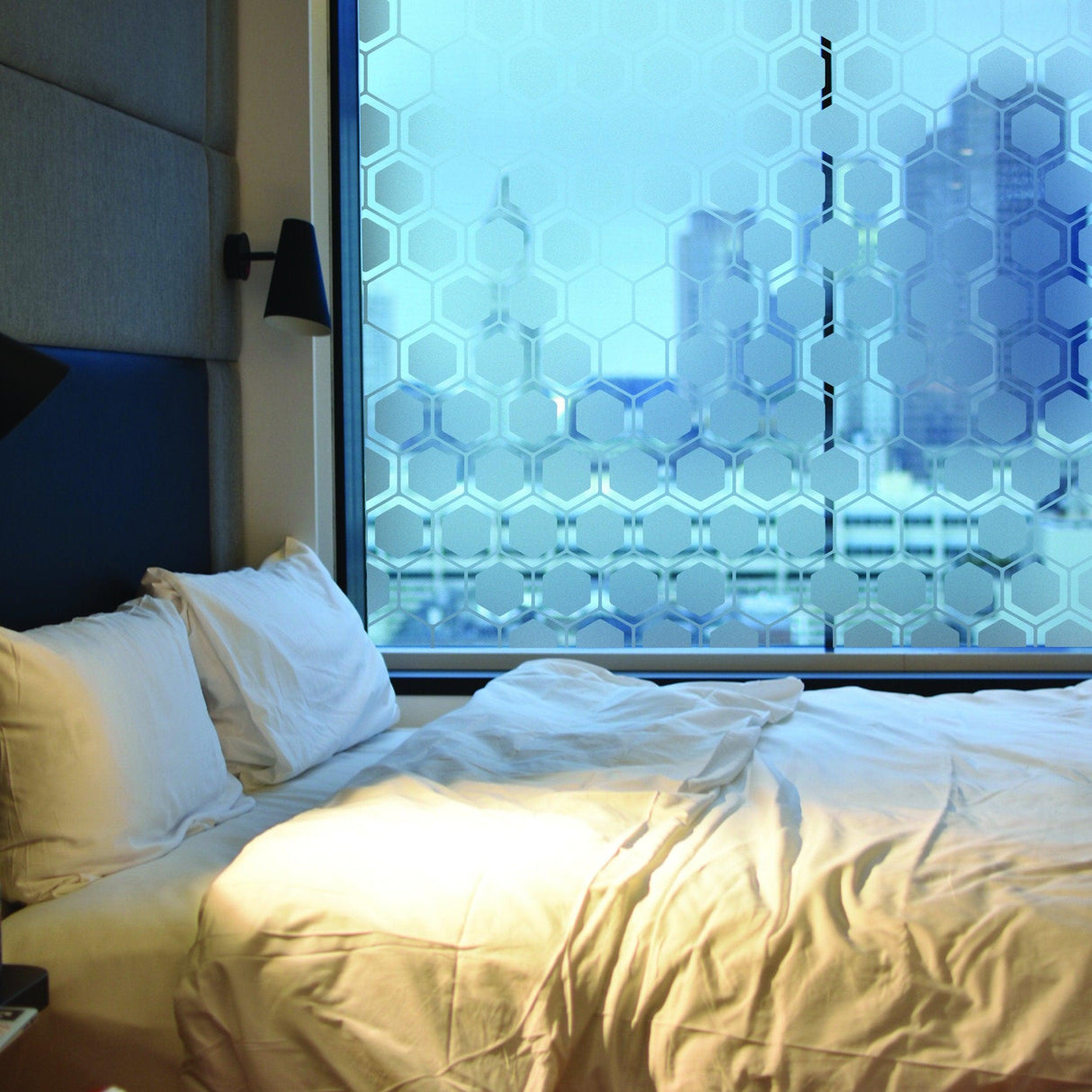 Frosted window film privacy decal on bedroom window, creating an elegant and serene atmosphere.