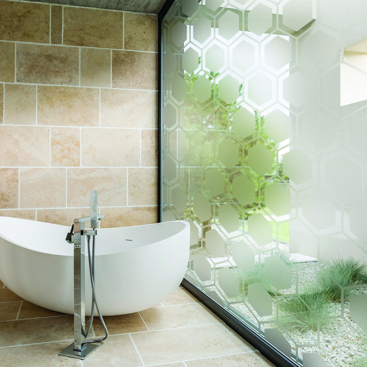 Stylish bathroom featuring a frosted window decal with hexagonal design, enhancing privacy and decor.