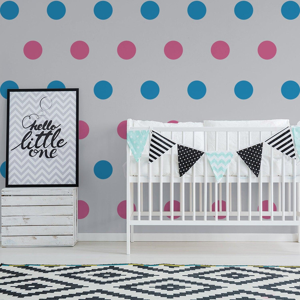 Kids room decor featuring colorful round wall decals, a crib, and playful wall art for a nursery.