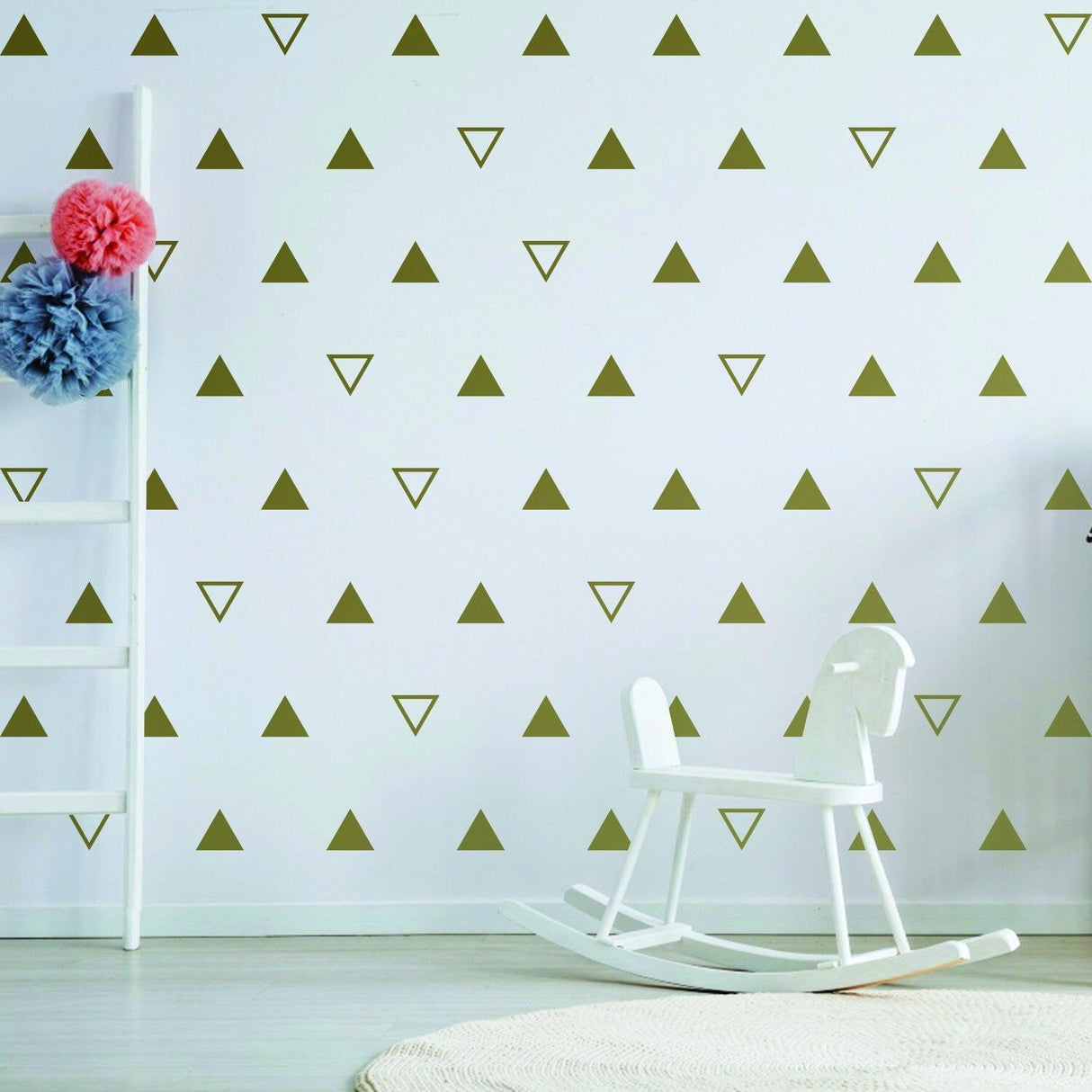 40x triangle wall vinyl decals in playroom with rocking chair and ladder, modern nursery decor.