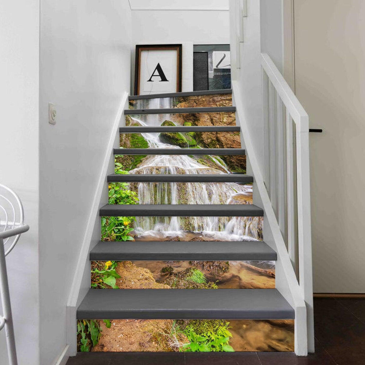 Stair riser vinyl decals featuring a waterfall scene, adding a natural touch to home stairs.