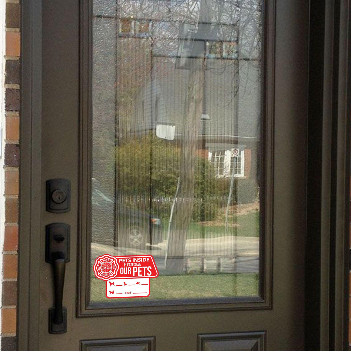 Door with Pet Alert Emergency Cling Sticker indicating pets are inside for emergency responders.