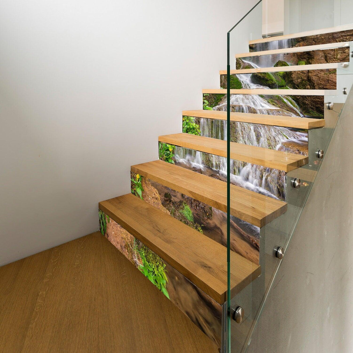 Vibrant stair riser vinyl decals featuring a waterfall design on wooden stairs.