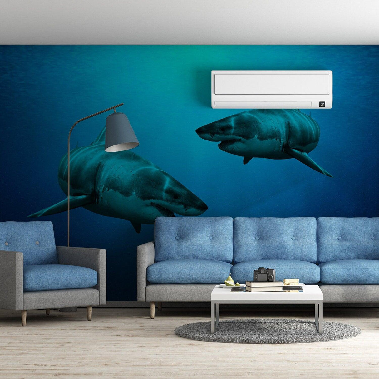 3D wallpaper shark decor in a cozy living room with blue sofa, showcasing underwater scene and realistic sharks.