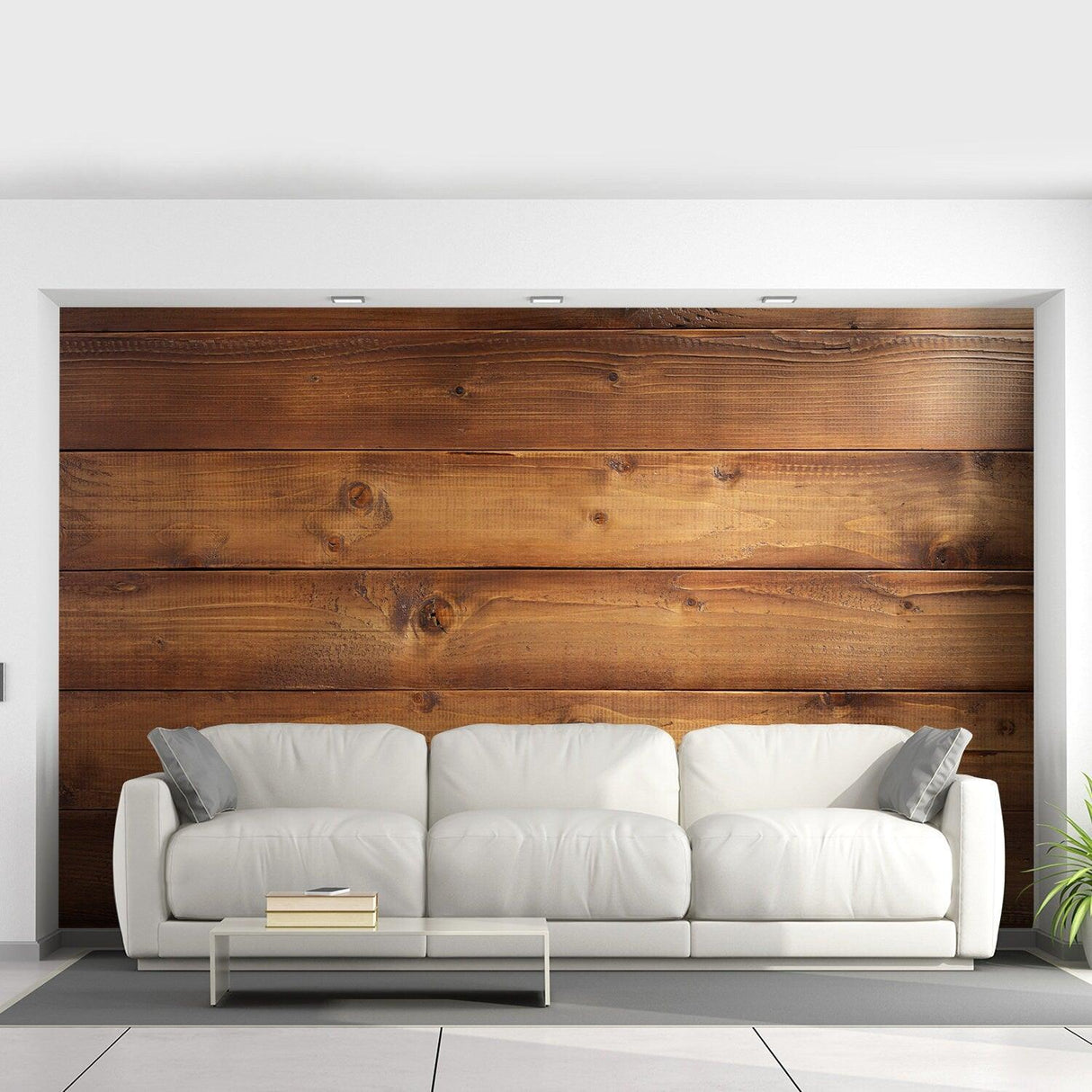 Modern living room with a white sofa in front of a wooden wall panel, showcasing a warm wood effect design.