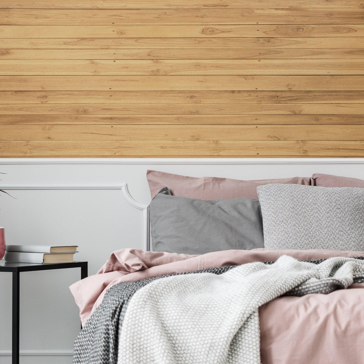 Cozy bedroom featuring shiplap peel and stick wallpaper sticker in a warm wood finish.