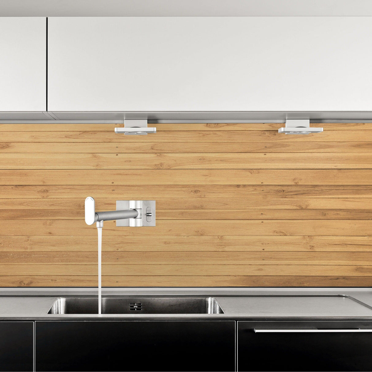 Shiplap peel and stick wallpaper sticker in a modern kitchen, featuring a wood plank design behind a stainless steel sink.